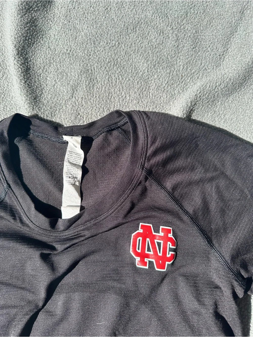 lululemon athletica Black Long Sleeve Top with Red NC Chest Logo